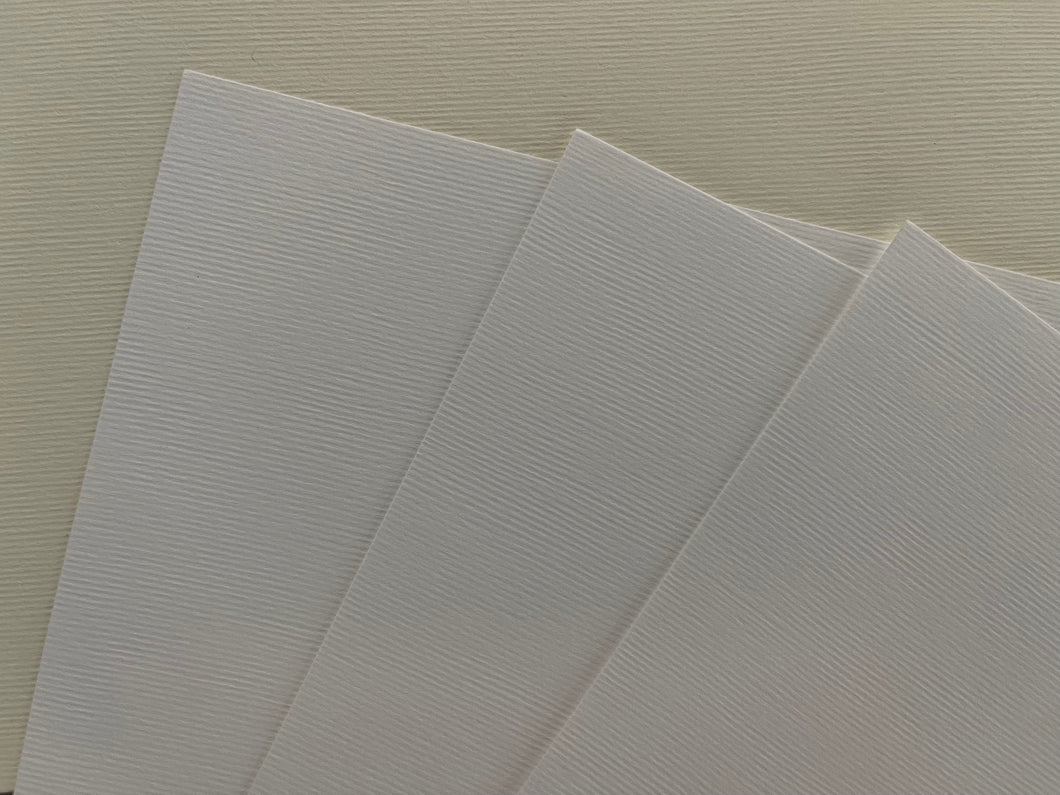 Cartulina Nettuno con textura 215 grs - Blanco Ártico
